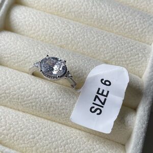 Charmed Aroma - Round Halo Solitaire Ring in Silver Tone - Size 6